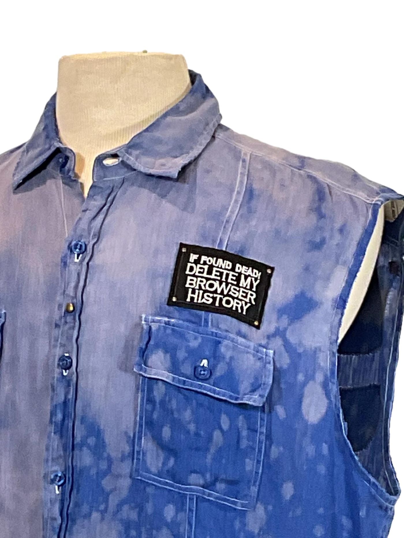 WEIRD CHARACTER Men's Custom Sleeveless Shirt with a unique patch, showcasing detailed stitching and a tailored fit, reflecting the bold style of DEVIOUS SAINT.