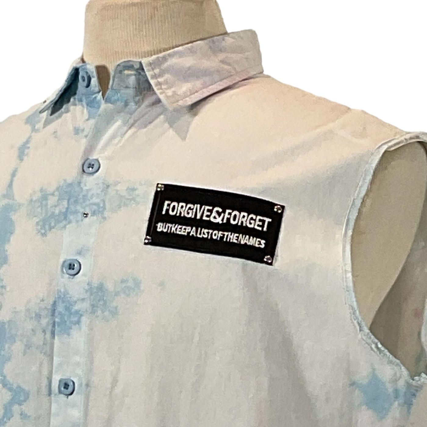 PADRINO SHARK Men's Custom Sleeveless Shirt, featuring a close-up of its collar and buttons, highlighting its unique, bold design from DEVIOUS SAINT.