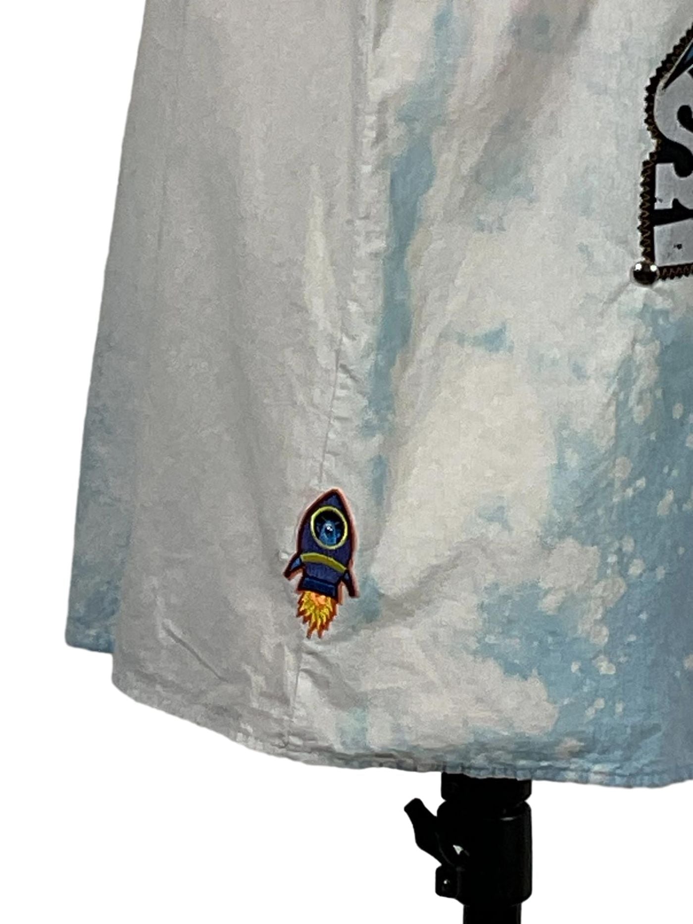 Close-up of the PADRINO SHARK Men's Custom Sleeveless Shirt, showcasing unique design details on a pre-owned, 100% cotton garment. Size medium, length 27 inches.