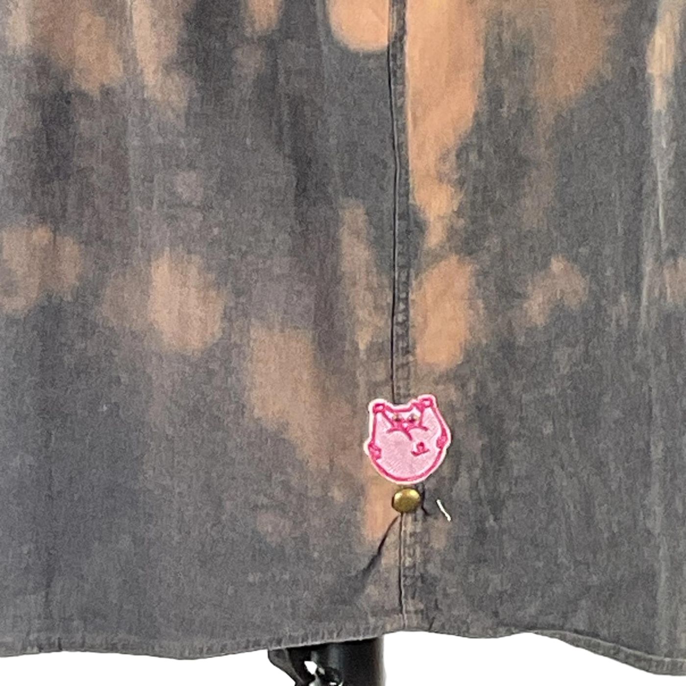 Close-up of SMILE BRO Men's Custom Sleeveless Shirt featuring bold, distinctive design with unique handwriting and child art motifs, embodying Devious Saint's wearable art ethos.