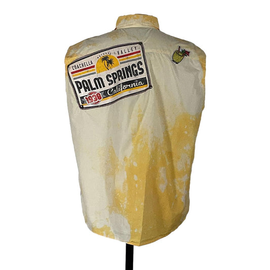 PALM SPRINGS Men's Custom Sleeveless Shirt, yellow and white with unique patches, featuring a pineapple drink drawing and palm tree logo.