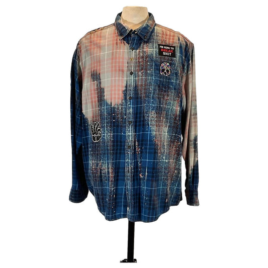 NASA Men's Custom Long-Sleeve Flannel Shirt in blue and red plaid, featuring a distinctive design with patches, shown on a mannequin.