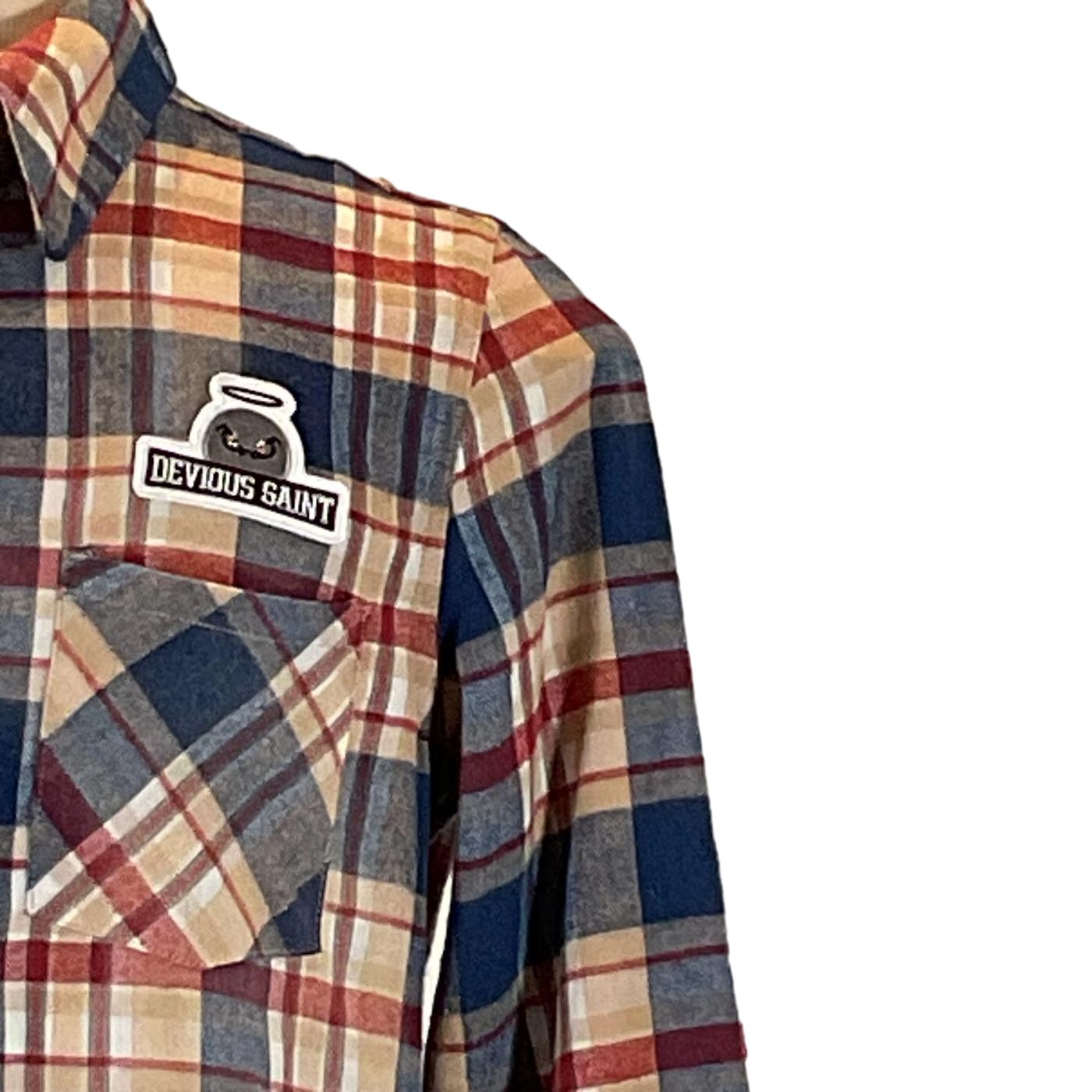 PERMANENTLY TIRED Men's Custom Long-Sleeve Flannel Shirt, featuring a close-up view highlighting its plaid pattern and button details, reflecting DEVIOUS SAINT's unique style.