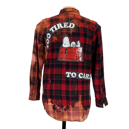 TOO TIRED TO CARE Men's Custom Long-Sleeve Flannel Shirt features a red and black plaid pattern with a cartoon dog on the back.