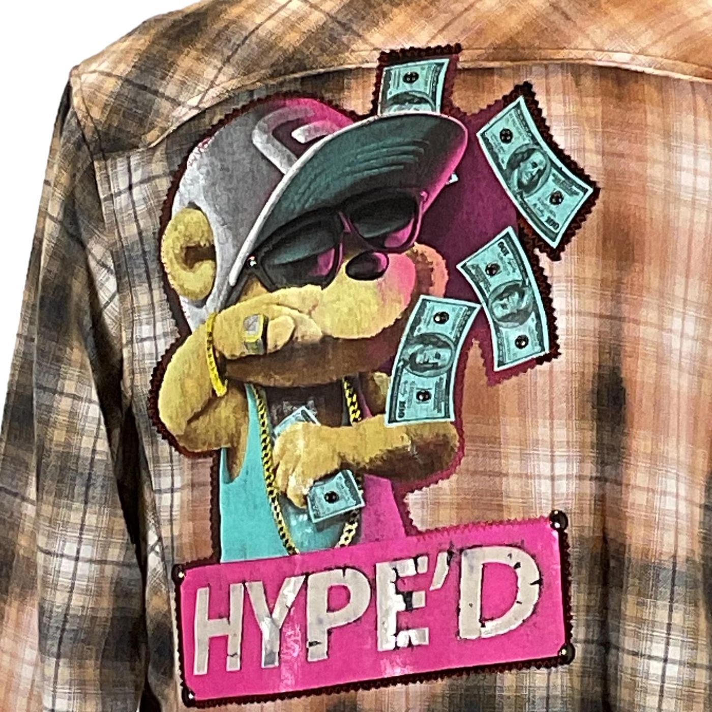 HYPE'D Men's Custom Long-Sleeve Flannel Shirt featuring a cartoon bear holding money on the back of a plaid design.