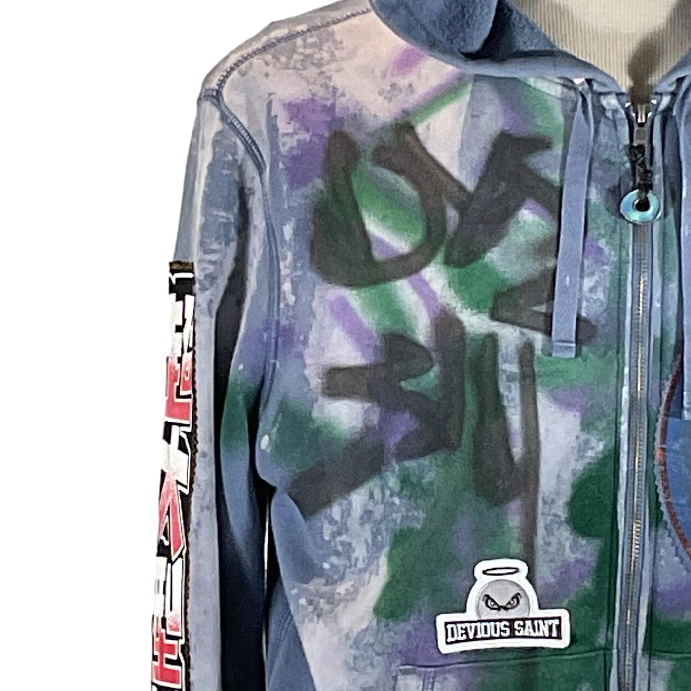 BOY ANIME Custom Men's Hoodie featuring graffiti-style artwork, worn by a person, showcasing its distinctive design and sleeve detailing.