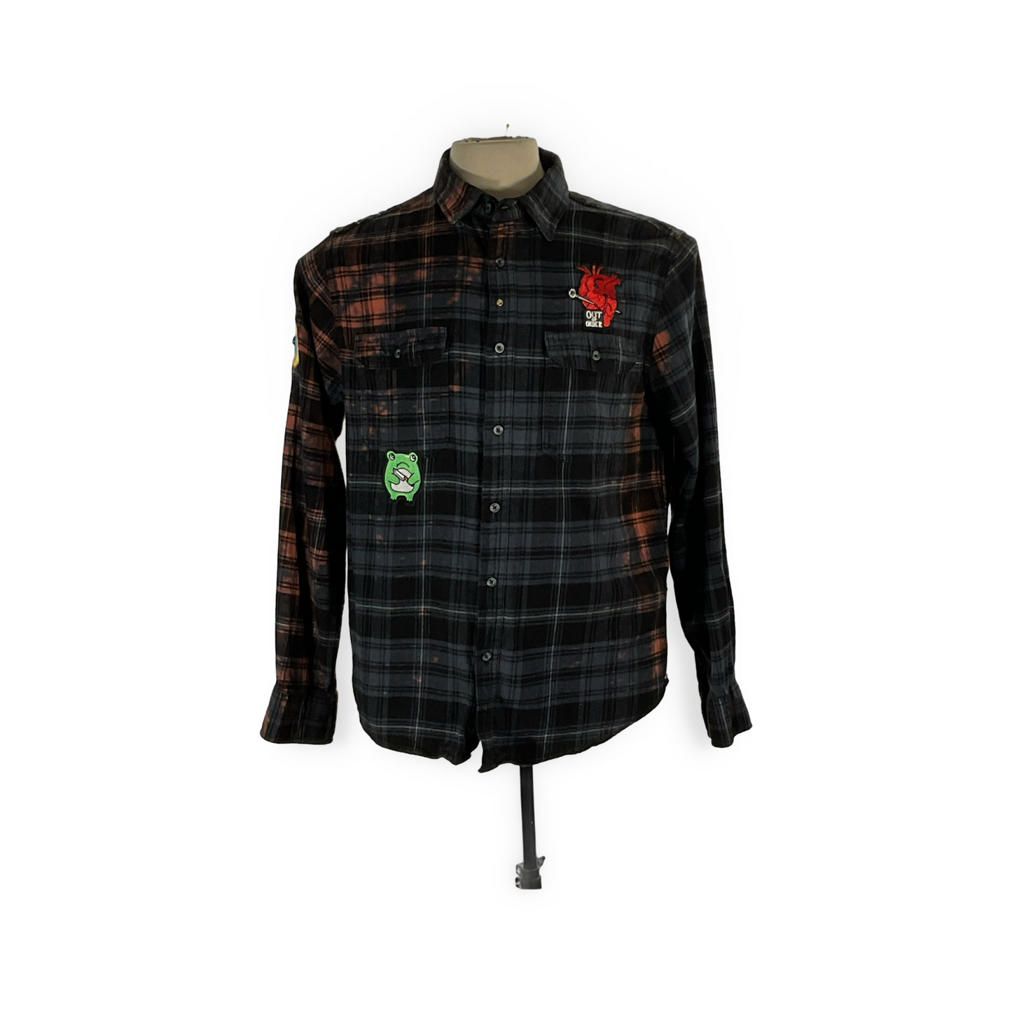 GET FUNKED UP flannel: A unique long sleeve with hand-patched details and metal studs, showcasing a vintage aesthetic and sustainable craftsmanship.