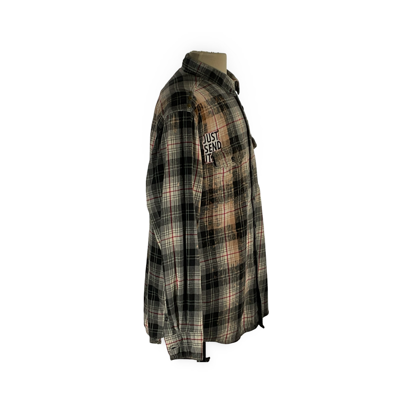 Cyber Bear long sleeve flannel on mannequin, featuring hand-patched details and metal studs, showcasing sustainable fashion with a unique vintage aesthetic.