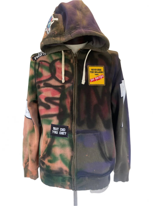 STICH Custom Men's Hoodie with bold character stitching, edgy design, and unique patchwork detail on sleeve, embodying Devious Saint's distinctive and fearless style.