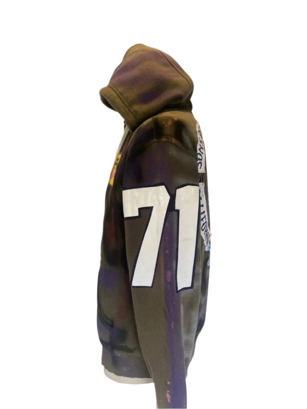Close-up of STICH | Custom Men's Hoodie | showcasing its bold graffiti patchwork design, exemplifying the unique and edgy style of DEVIOUS SAINT's wearable art.