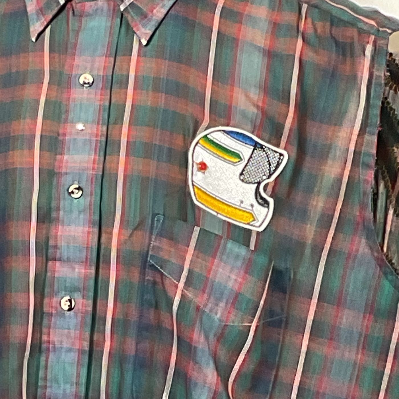 MORE THAN MY CURVES Men's Custom Sleeveless Shirt featuring a helmet patch on plaid fabric, showcasing unique, bold design from DEVIOUS SAINT.