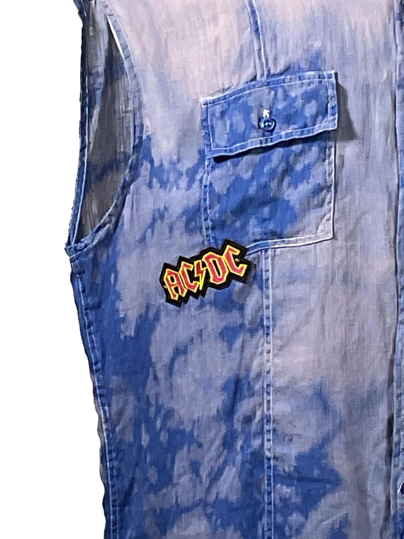 WEIRD CHARACTER Men's Custom Sleeveless Shirt, featuring a close-up of its unique blue linen texture and detailed stitching, epitomizing bold, distinctive design.
