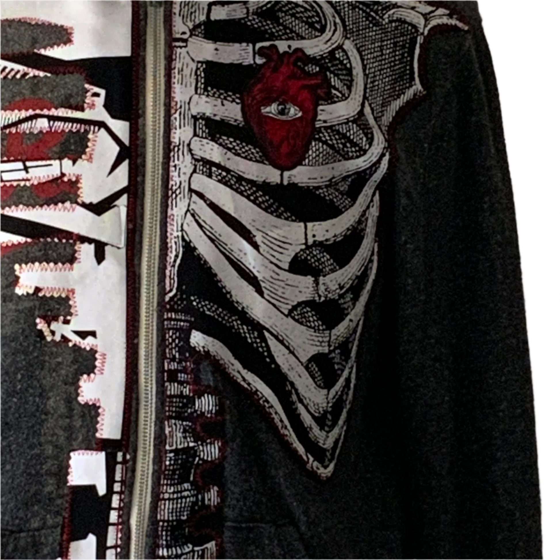 BAUHAUS Custom Men's Hoodie in medium size, featuring a stylized skeleton ribcage with a red anatomical heart and eye motif, plus jagged cityscape graphics.