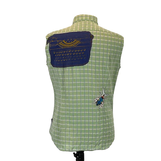 TYPEWRITER Men's Custom Sleeveless Shirt features green and white stripes with a distinctive bug patch, embodying bold, unique wearable art from DEVIOUS SAINT.