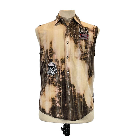 Mannequin displaying BABY JODA Custom Men's Sleeveless shirt, featuring a vest with patches, embodying bold and distinctive wearable art from DEVIOUS SAINT.