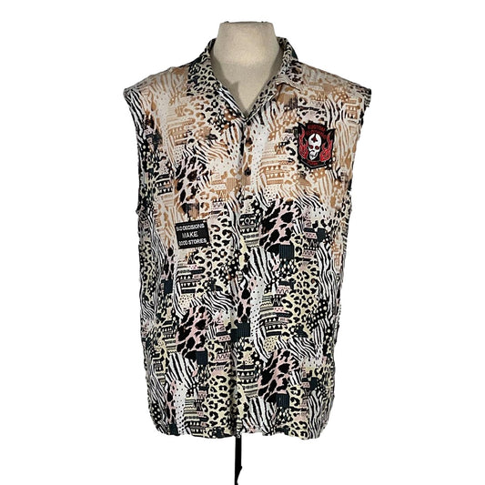Men's Custom Sleeveless Shirt on mannequin with skull and animal print design, showcasing bold fashion style from DEVIOUS SAINT.