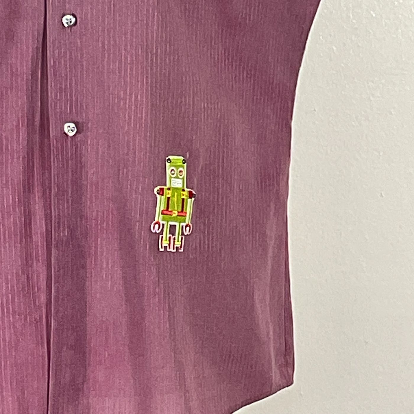 ATARI Men's Custom Sleeveless Shirt with cartoon robot pin, featuring a bold, artistic design from pre-owned cotton, size Large, embodying Devious Saint's unique style.