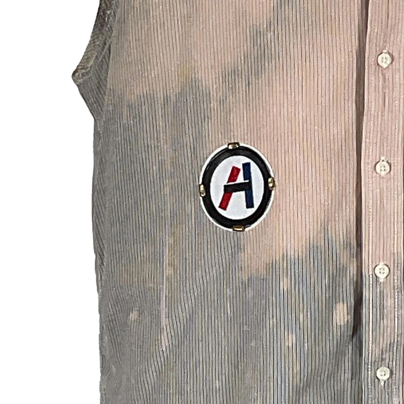 Close-up of FORT LAUDERDALE Men's Custom Sleeveless Shirt featuring a button-up design and logo, embodying DEVIOUS SAINT's unique, bold style.