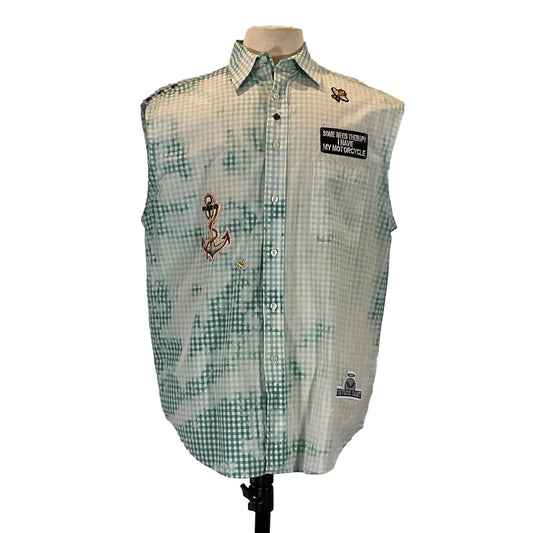 PAW Men's Custom Sleeveless Shirt in green and white plaid, displayed on a mannequin, emphasizing its bold and distinctive design.