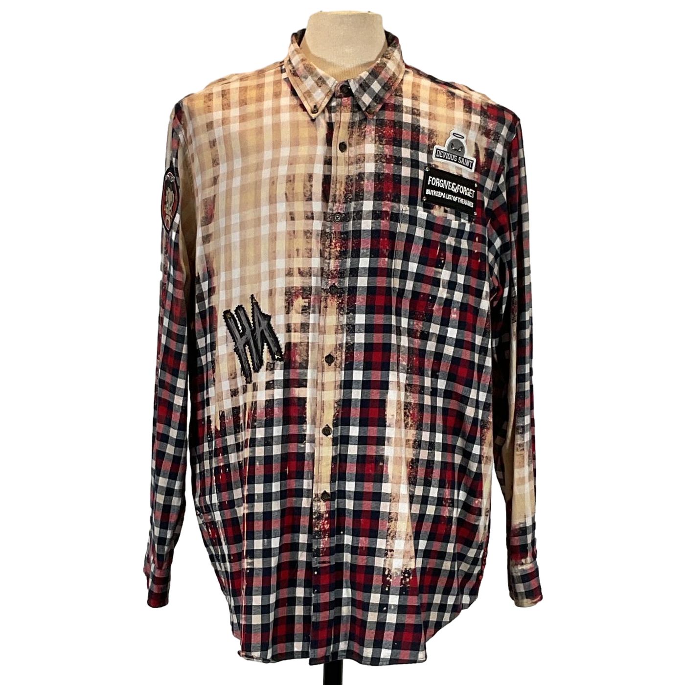 NIRVANA Men's Custom Long-Sleeve Flannel Shirt on mannequin, featuring a red plaid pattern with unique patch detail, showcasing bold, artistic design.