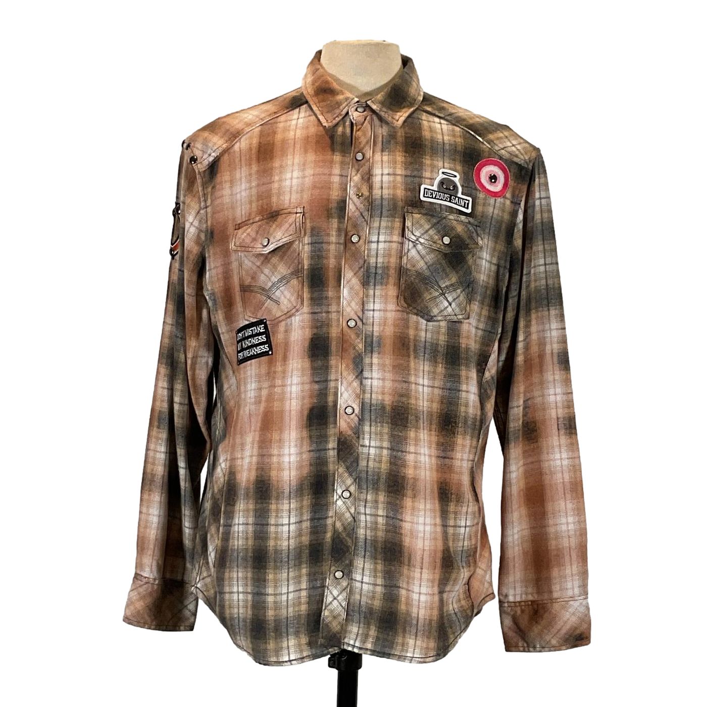 HYPE'D Men's Custom Long-Sleeve Flannel Shirt on mannequin, featuring a brown and black plaid pattern with a visible pocket, embodying distinctive wearable art.