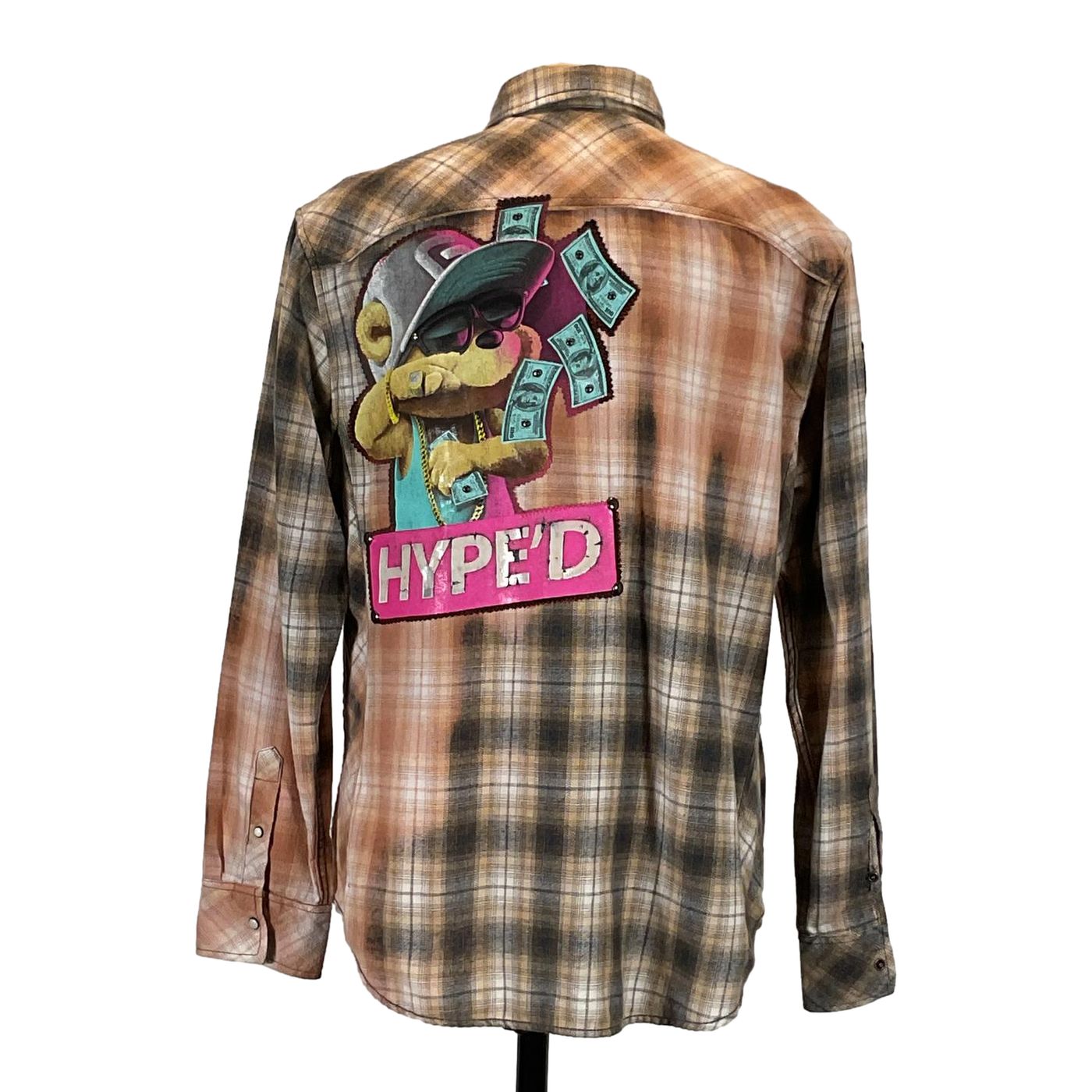 HYPE'D Men's Custom Long-Sleeve Flannel Shirt featuring a plaid pattern and a cartoon bear patch.