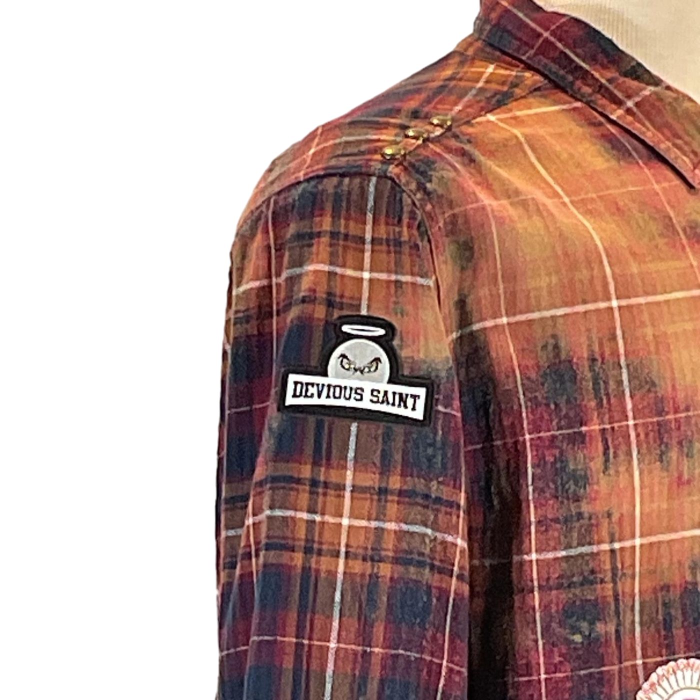 Close-up of the CASSETTE Men's Custom Long-Sleeve Flannel Shirt, showcasing plaid pattern and button details, crafted with distinctive, bold design by DEVOIOUS SAINT.