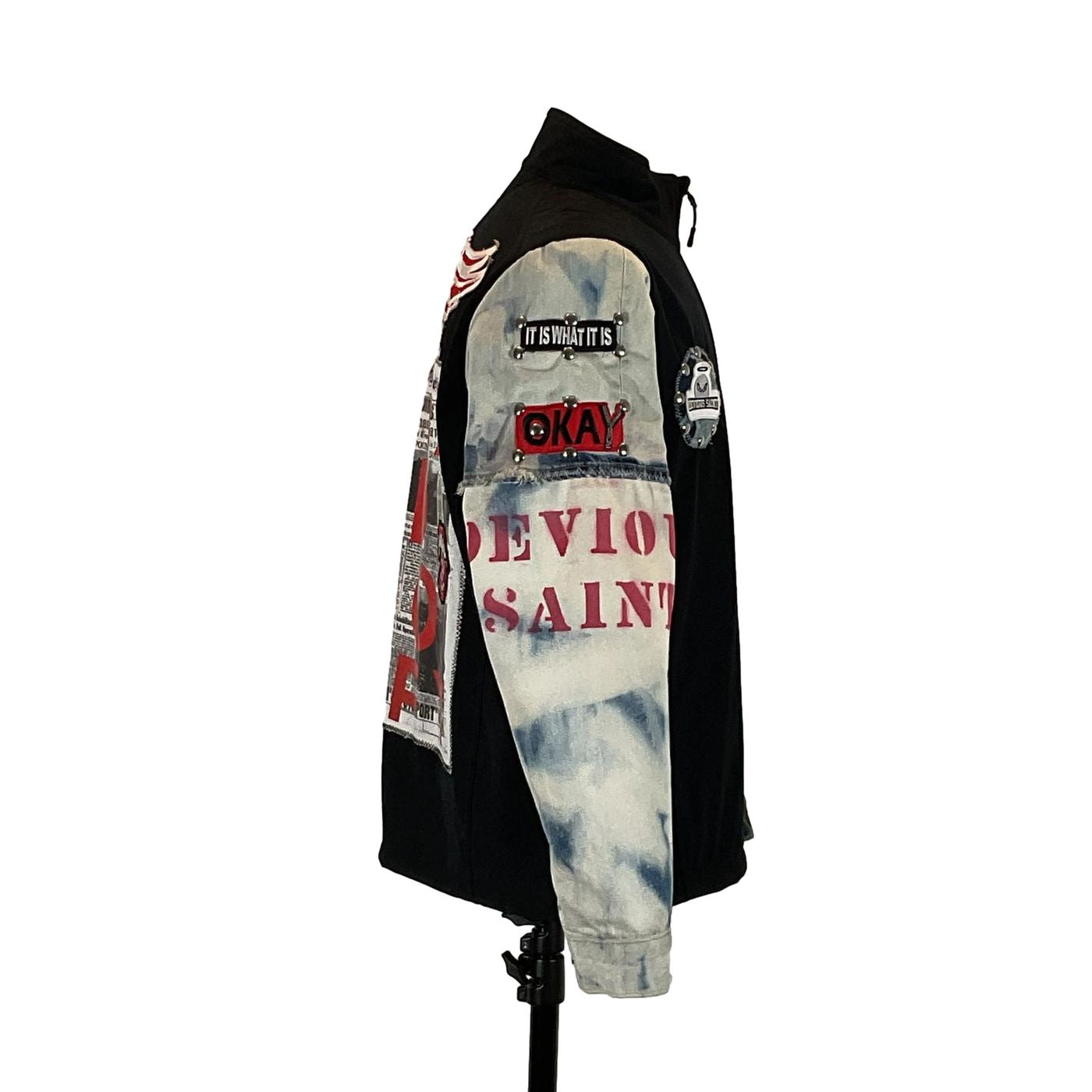 DETROIT RED WINGS Custom Men's Jacket with denim sleeves displayed on a stand, showcasing its unique, artful design, reflecting wearable art from pre-owned garments.