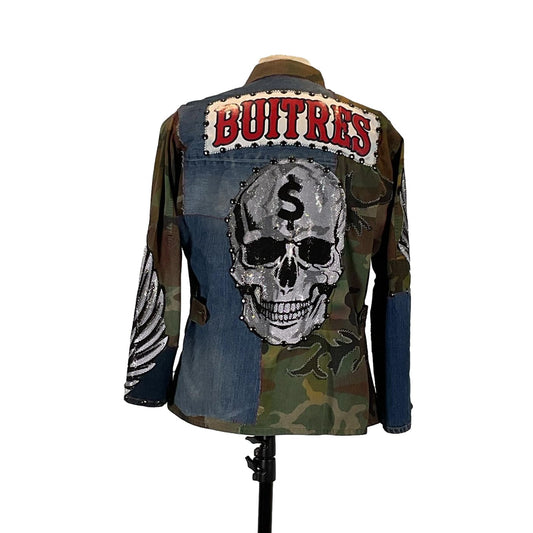 BUITRES Men's Custom Jacket by Devious Saint featuring a camouflage design with a silver skull and dollar sign embellishment. Size Large, detailed with rhinestones.