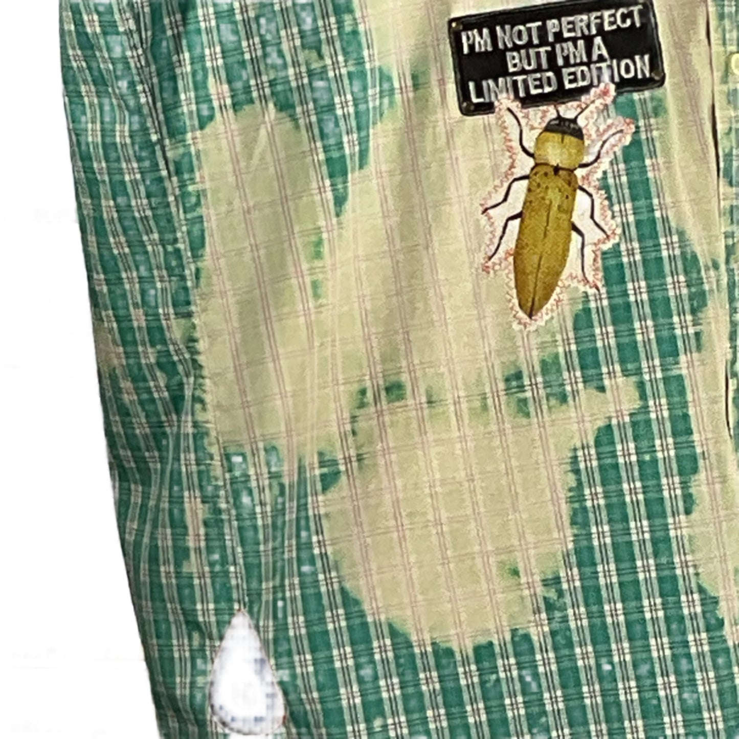 Papa Bear sleeveless shirt, featuring a custom design with a bug patch, emphasizes comfort and style, reflecting Devious Saint’s bold, unique wearable art ethos.
