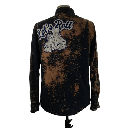 Men's custom long-sleeve flannel shirt, LET’S ROLL!, with roller skate graphic on the back, embodying Devious Saint's unique, bold style.