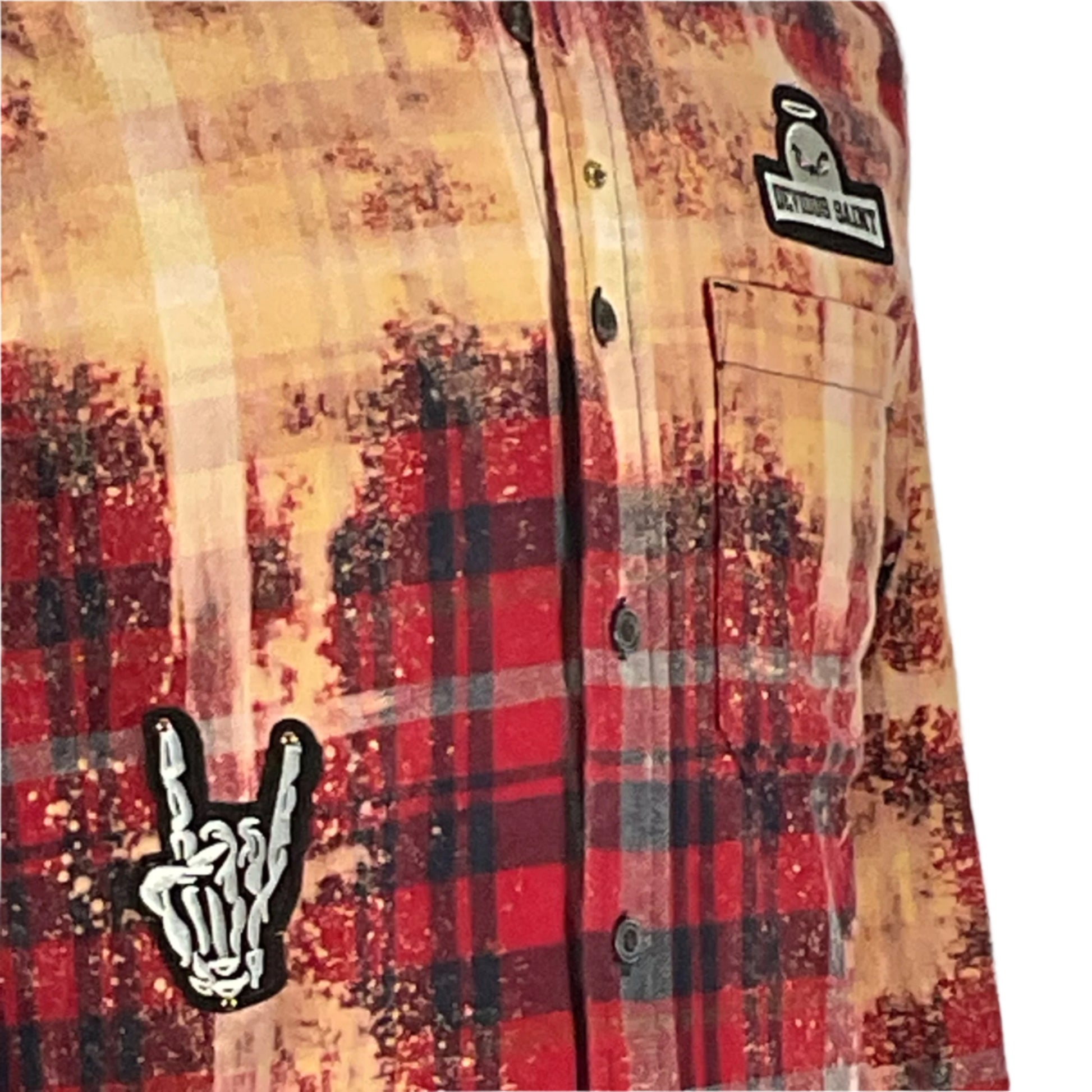 A man wears the bold Let’s Roll large plaid flannel shirt, embodying distinctive style and rugged comfort from DEVIOUS SAINT's unique apparel collection.
