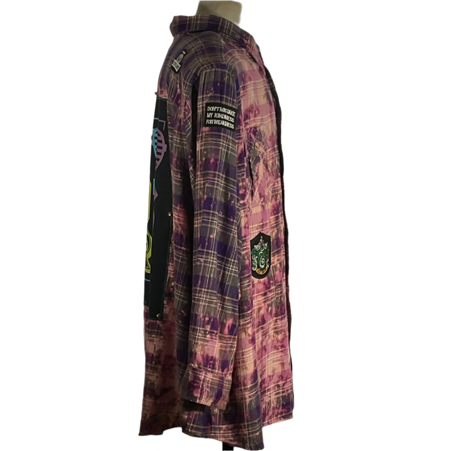 Pink Floyd men's custom long-sleeve flannel shirt on a mannequin, showcasing bold pattern and rock-inspired style, embodying Devious Saint's unique, wearable art ethos.