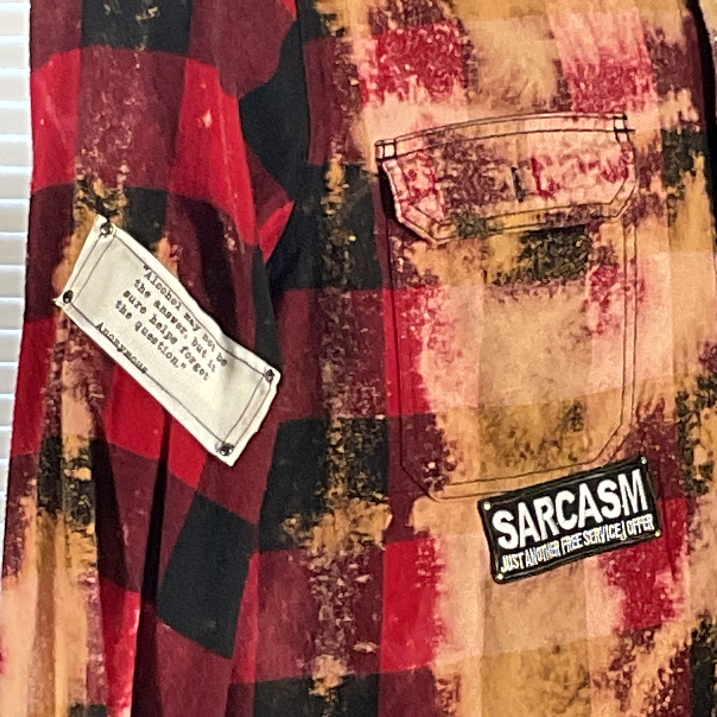 Close-up of IRON MAIDEN Men's Custom Long-Sleeve Flannel Shirt, 3XL, showcasing the bold, patterned fabric and distinctive design, embodying DEVIOUS SAINT's unique, wearable art ethos.