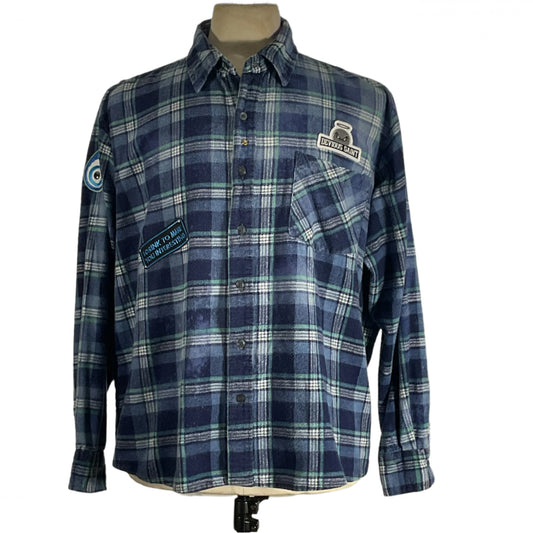 Blue plaid shirt on mannequin, showcasing the Iron Maiden Men's Custom Long-Sleeve Flannel Shirt in 3XL from DEVIOUS SAINT, highlighting its bold style and rugged comfort.
