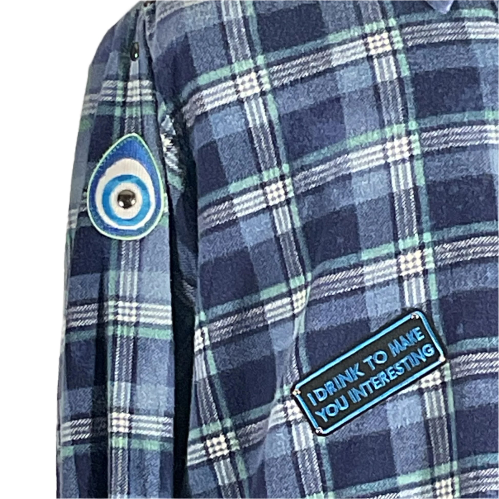 A person wears the Iron Maiden Men's Custom Long-Sleeve Flannel Shirt, showcasing its bold plaid design and unique sleeve patch.