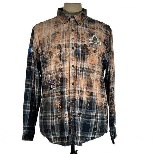 Iron Maiden Men's Custom Long-Sleeve Flannel Shirt on mannequin, featuring bold patches and rugged flannel design. Ideal for making a statement. Size 3XL.