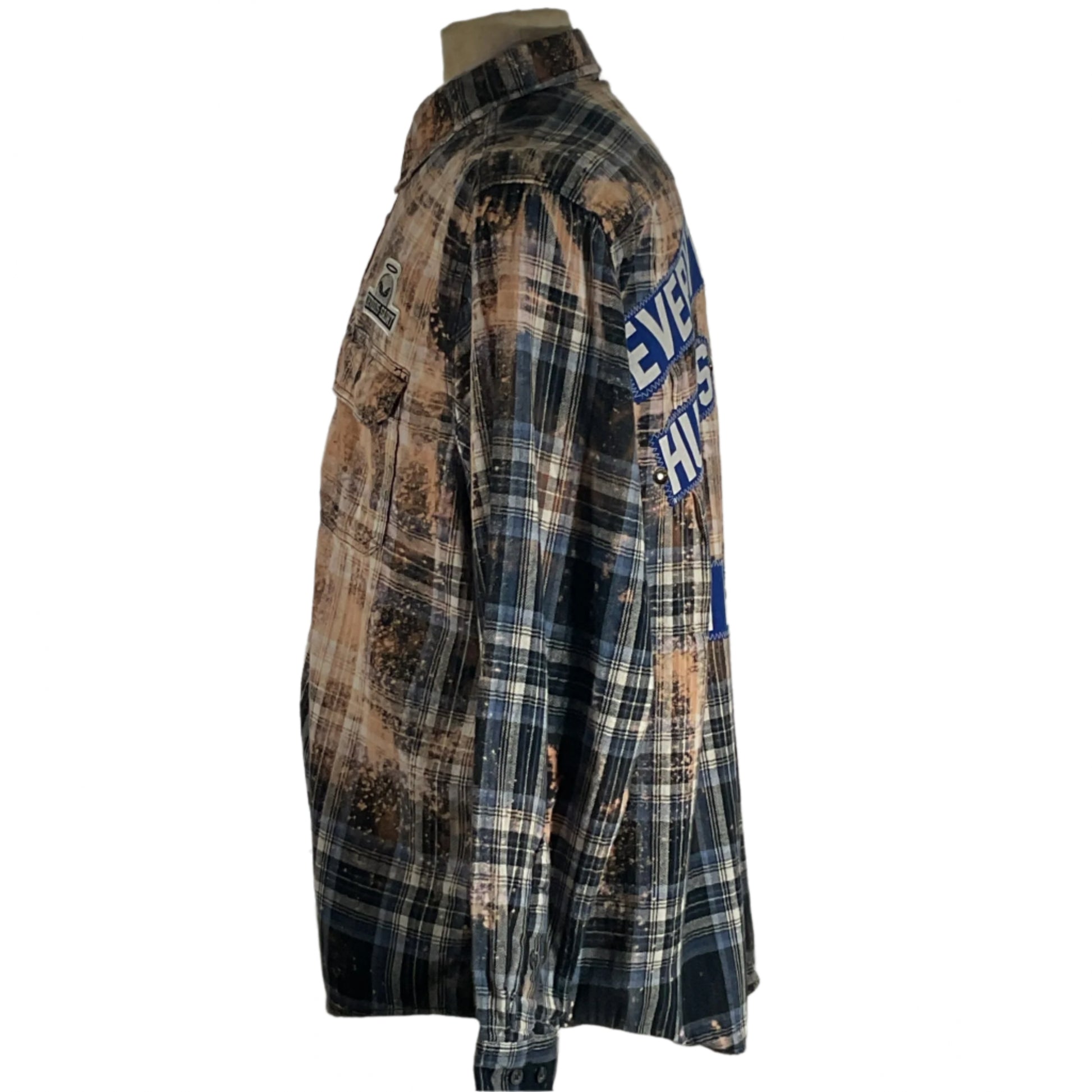 Mannequin dressed in the EVERYTHING HURTS… Men's Custom Long-Sleeve Flannel Shirt, XL, highlighting its bold, distinctive design and cozy flannel fabric.