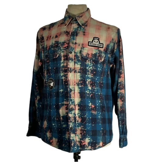 Men's BE KIND long-sleeve flannel shirt on a mannequin, showcasing comfort and style with a positive message, designed by DEVIOUS SAINT.