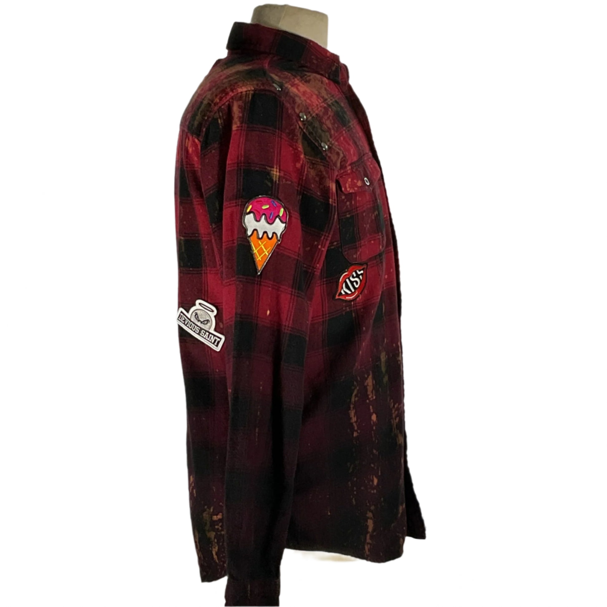 BATMAN/SPIDERMAN Custom long sleeve flannel on mannequin, showcasing hand-patched details and metal studding, embodying sustainable, unique fashion by DEVIOUS SAINT.