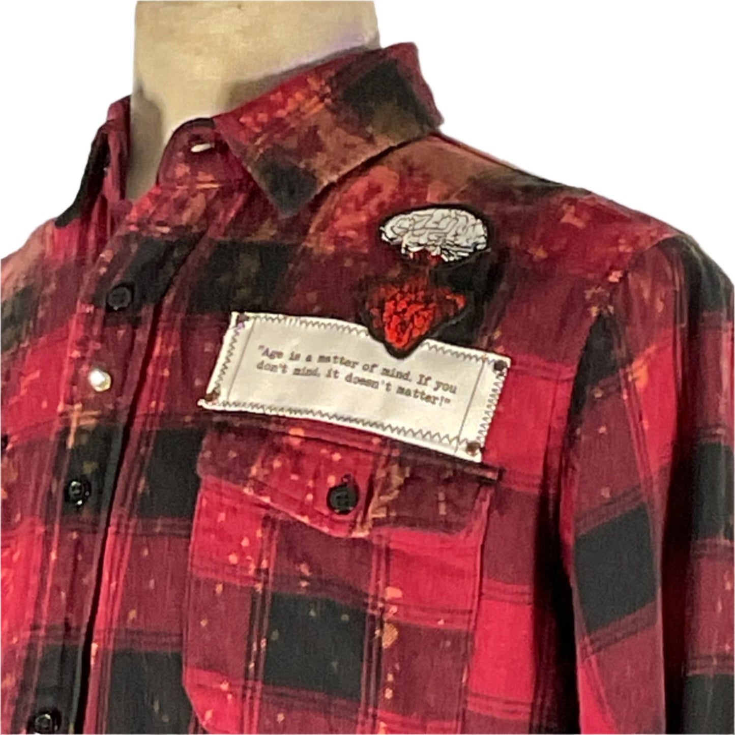 BATMAN/SPIDERMAN custom long sleeve flannel with hand-patched details and metal studs, showcasing a unique, sustainable, vintage aesthetic. Size: Small.