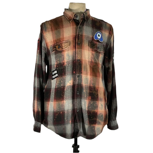 Men's custom long-sleeve flannel shirt on mannequin, featuring patches and BE KIND design, embodying unique, bold style from DEVIOUS SAINT.