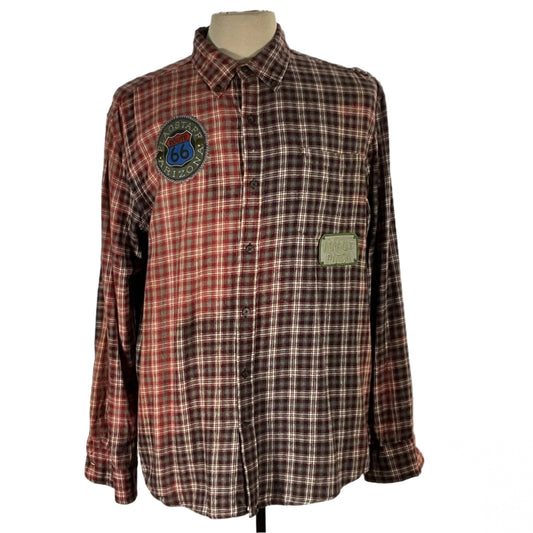 Plaid flannel shirt on a mannequin, titled NOBODY CARES | Men's Custom Long-Sleeve Flannel Shirt | LARGE, showcasing bold, unique fashion from DEVIOUS SAINT.