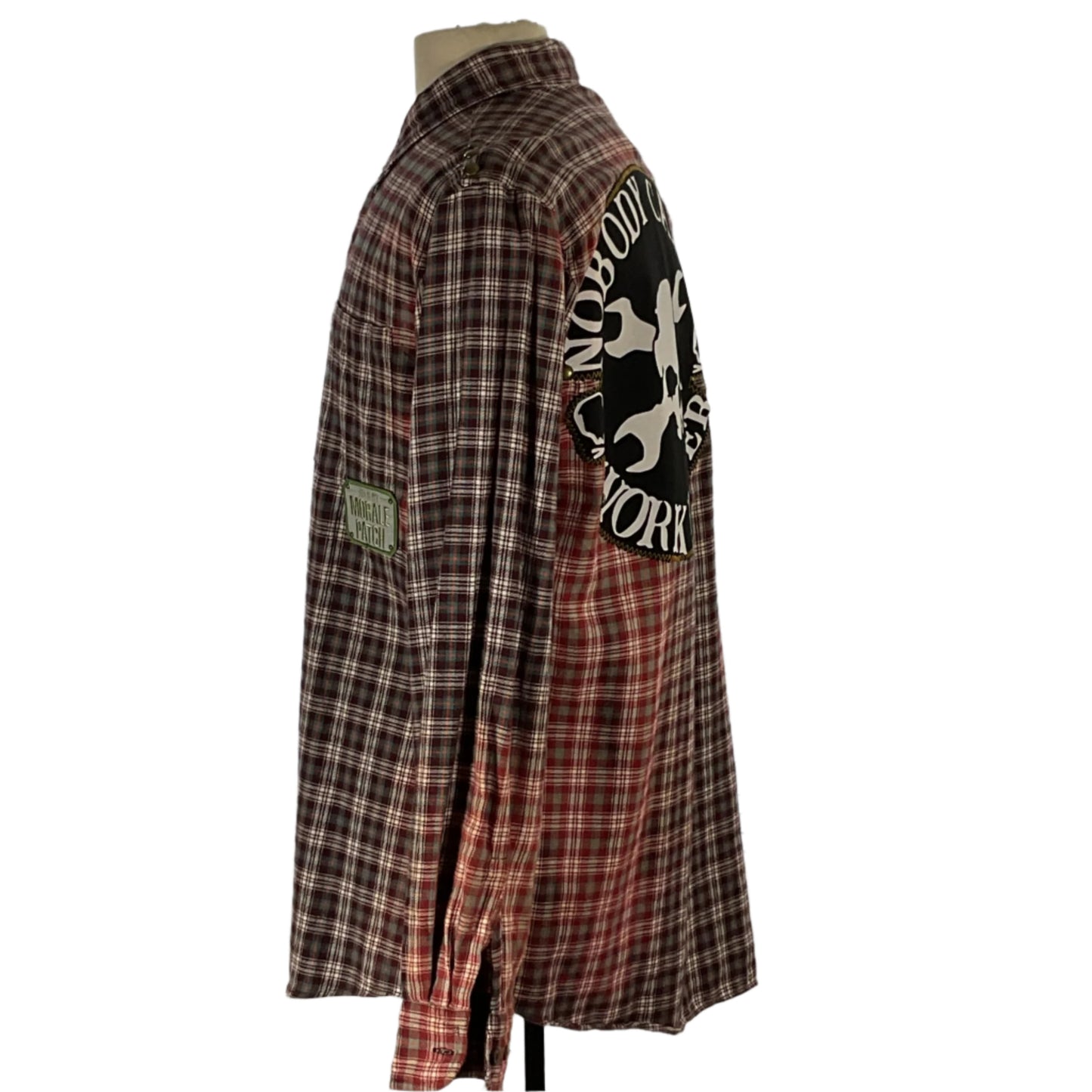 NOBODY CARES | Men's Custom Long-Sleeve Flannel Shirt in a unique pattern displayed on a mannequin, highlighting its tailored fit and distinctive design.