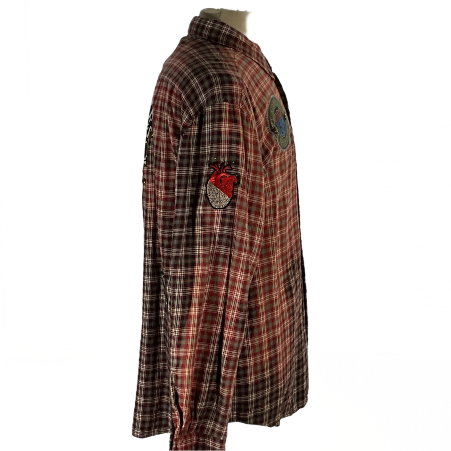 Men's custom long-sleeve flannel shirt in plaid with a heart patch, titled NOBODY CARES, showcasing detailed craftsmanship. Size: Large, with distinct shoulder and chest measurements.