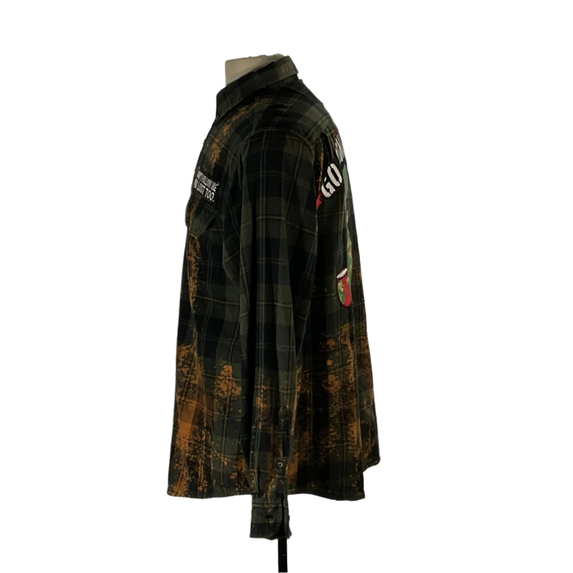 Close-up of the GO COMMANDO men's custom long-sleeve flannel shirt, showcasing its unique texture and design, emblematic of DEVIOUS SAINT's bold and distinctive style.