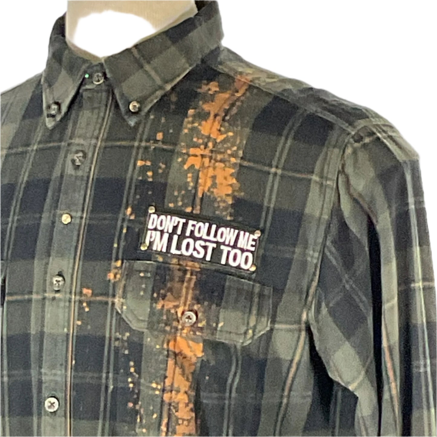 Close-up of the GO COMMANDO men's custom long-sleeve flannel shirt, showcasing its distinctive pattern and sleeve detail, embodying bold and unique style.