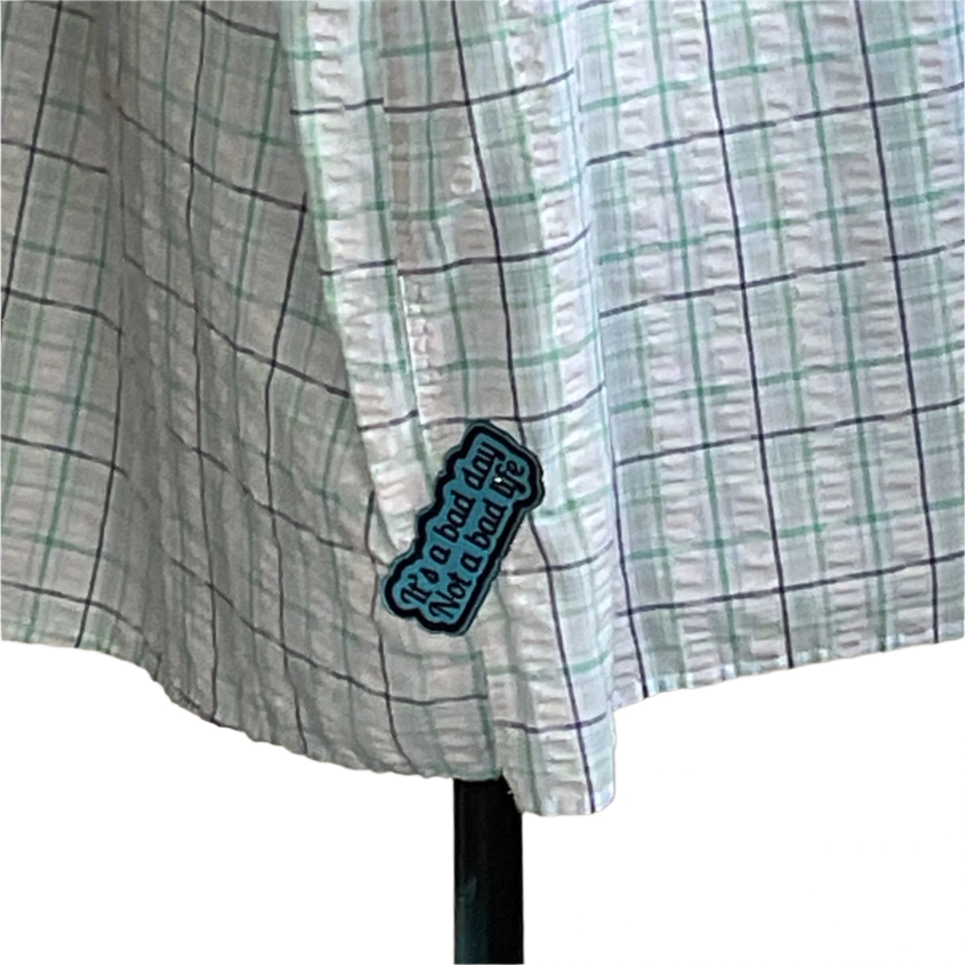 KING DB Men's Custom BEAR SIZE Short Sleeve Shirt, 4XL, featuring a bold embroidered patch, on a mannequin, showcasing a green and black grid pattern.