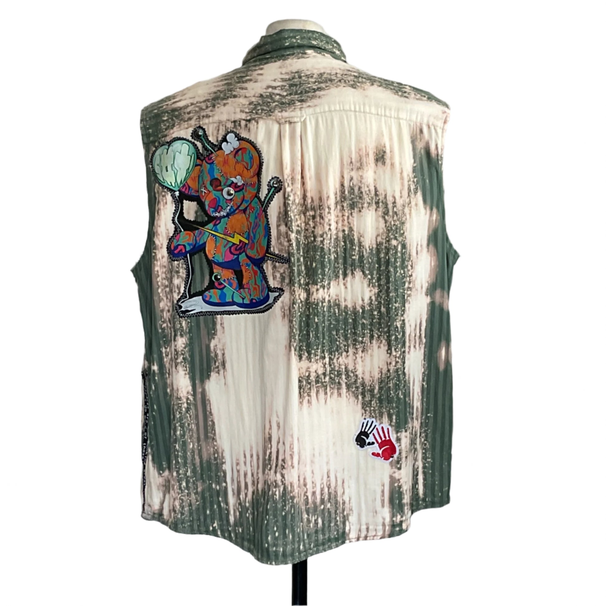 Patchwork Bear sleeveless shirt in 3XL, tie-dyed green/off-white, with cartoon bear and handprint patches, embodies a bold, DIY streetwear aesthetic.