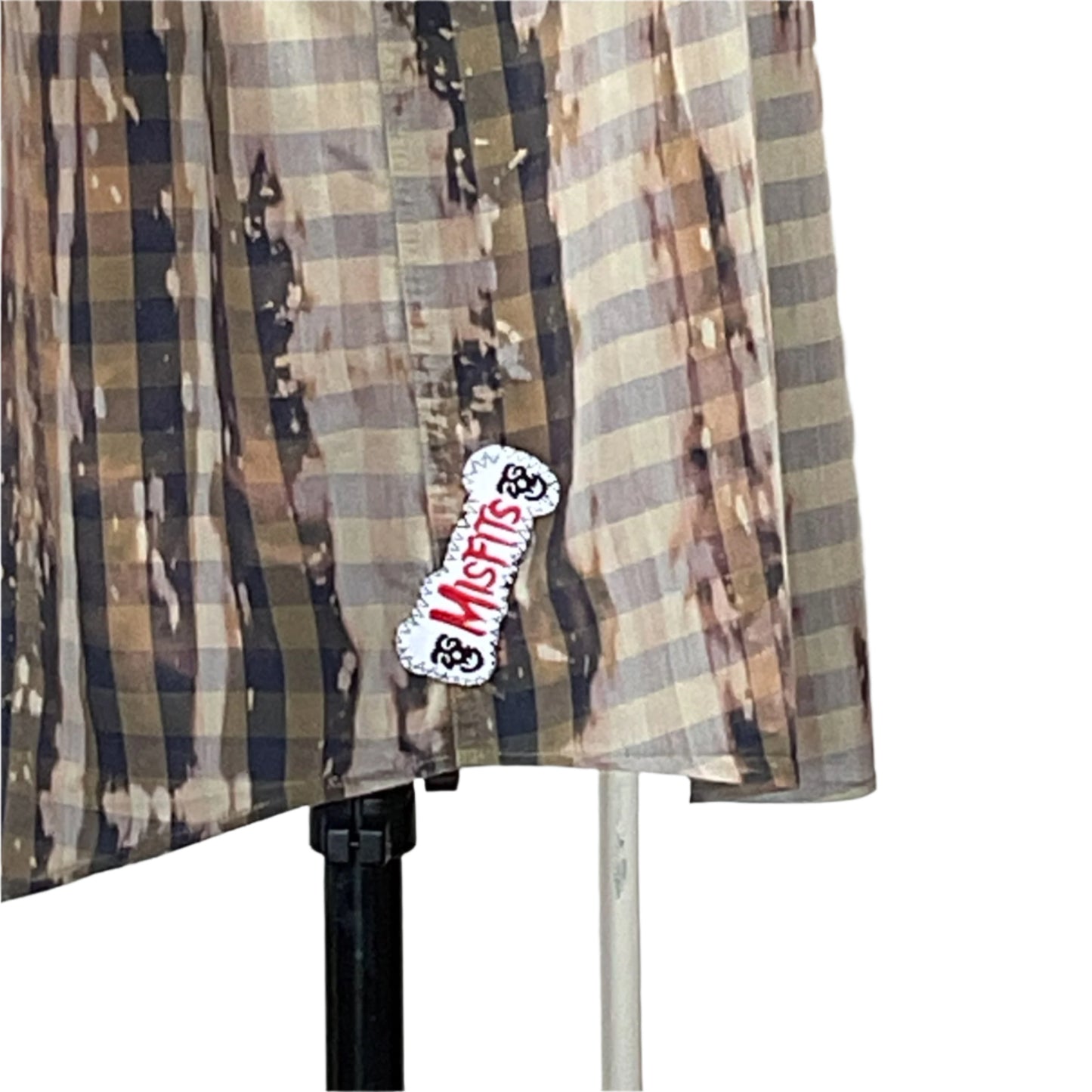 Plaid sleeveless shirt, olive-and-tan with bleach splatter, features Misfits patch. SEXY BEAR men's custom size 2XL, embodying bold, adventurous style.